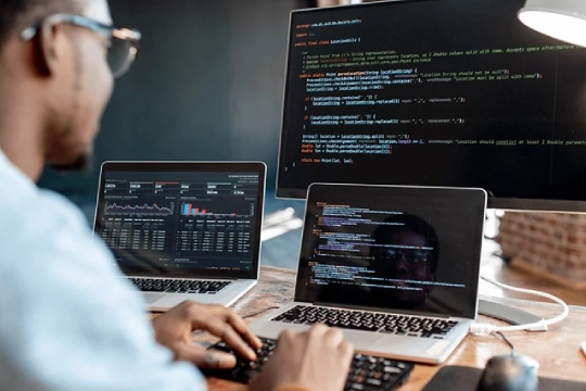 Web Development man working on content for a client